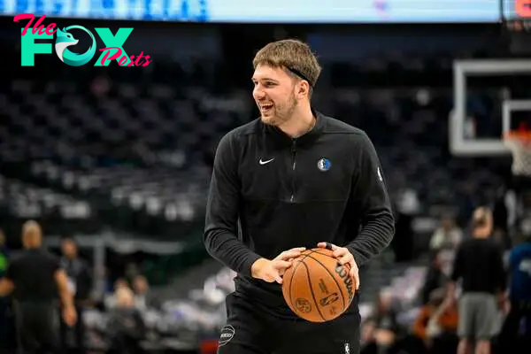 Dallas Mavericks guard Luka Doncic (77)