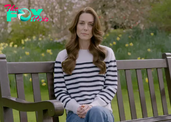 Kate Middleton sitting on a bench