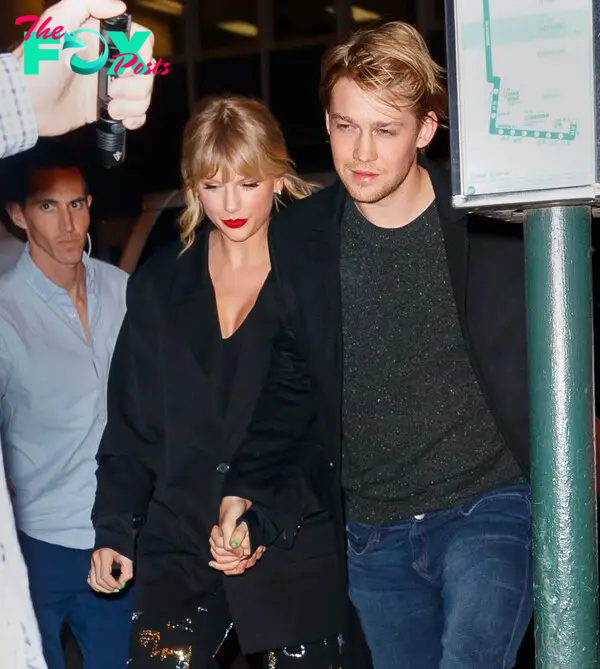 Taylor Swift and Joe Alwyn holding hands