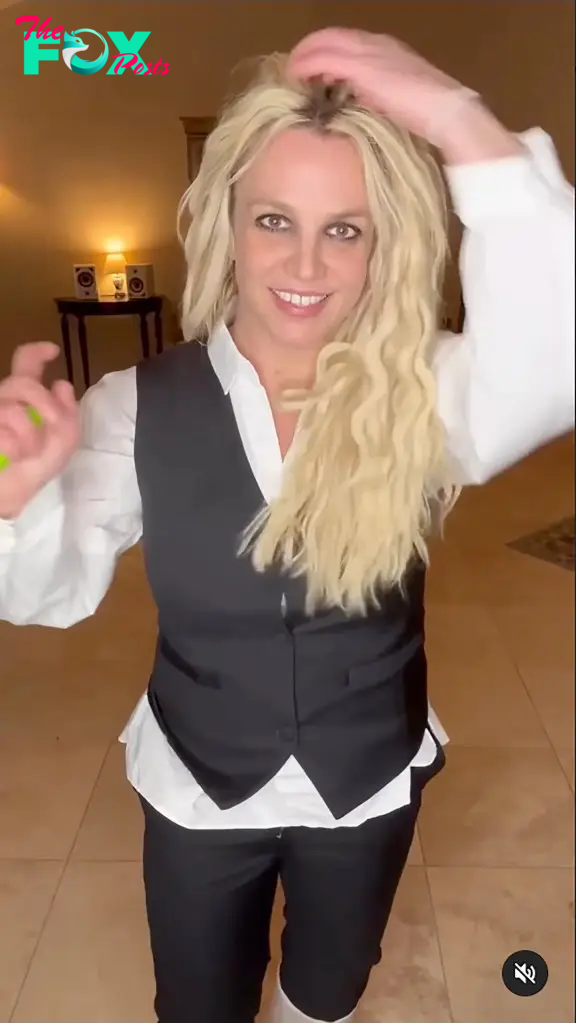 Britney Spears posing in an outfit