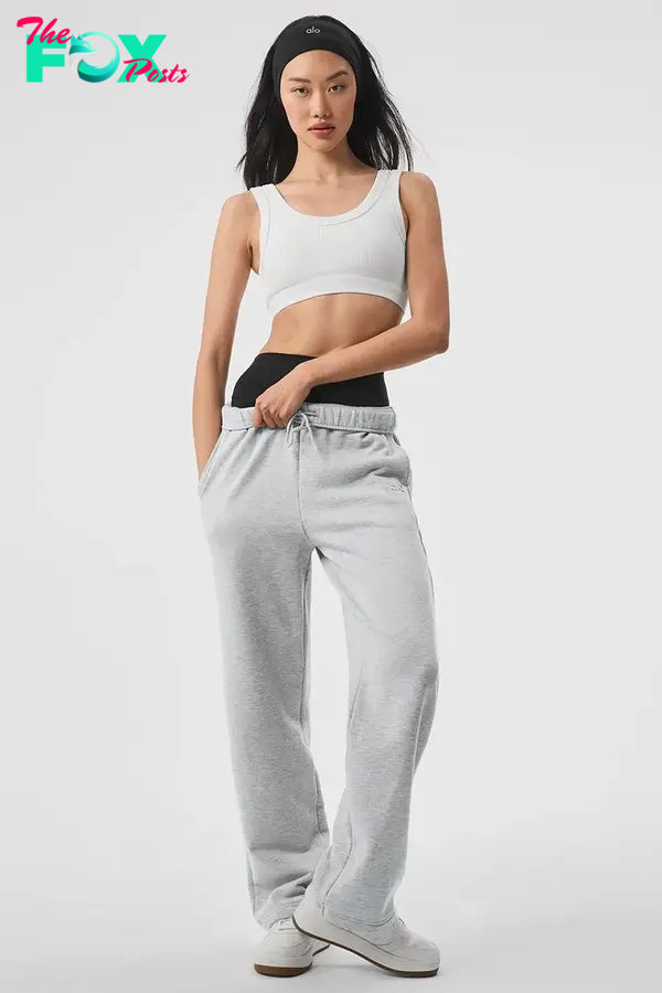 A model in gray sweatpants