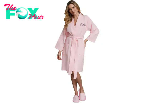 A model in a pink waffle robe