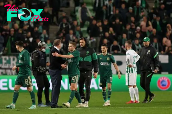 James Forrest of Celtic embraces Angelos Postecoglou, Manager of Celtic following victory in the UEFA Europa League group G match between Ferencvar...