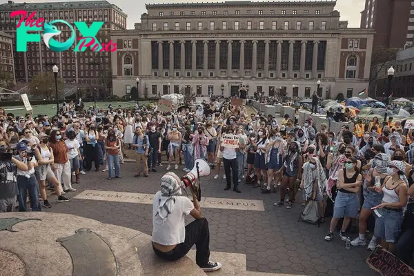 Protestors listen to a speaker during a pro-Palestinian encampment on Columbia University campus in New York City, on April 29.