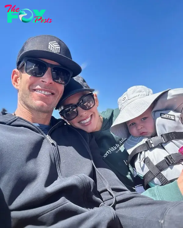 Heather Rae Young and Tarek El Moussa with their son Tristan. 