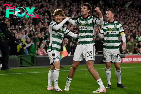 Kyogo Furuhashi,Matt O'Riley and Callum McGregor of Celtic celebrate during the UEFA Champions League match between Celtic FC and SS Lazio at Celti...