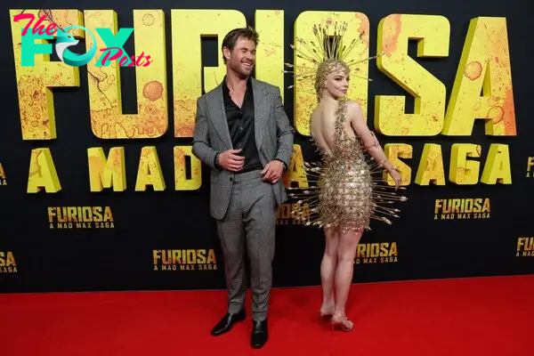 Chris Hemsworth and Anya Taylor-Joy wearing an arrow dress at the "Furiosa: A Mad Max Saga" premiere in Australia