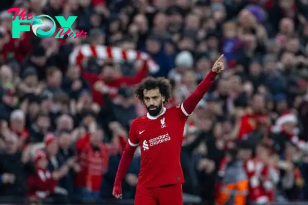 LIVERPOOL, ENGLAND - Saturday, December 23, 2023: Liverpool's Mohamed Salah celebrates after scoring the first equalising goal during the FA Premier League match between Liverpool FC and Arsenal FC at Anfield. (Photo by David Rawcliffe/Propaganda)