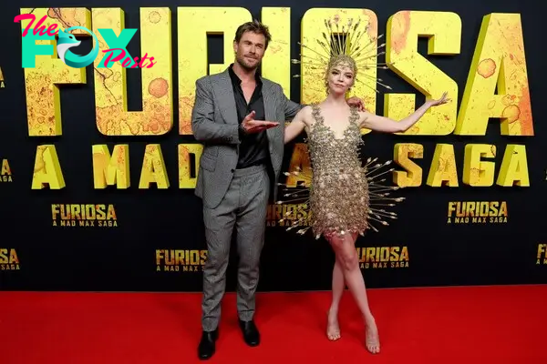 Chris Hemsworth and Anya Taylor-Joy wearing an arrow dress at the "Furiosa: A Mad Max Saga" premiere in Australia