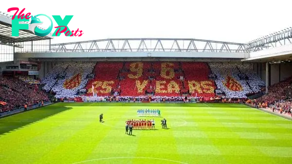LIVERPOOL, ENGLAND - Sunday, April 13, 2014: The supporters on the Spion Kop make a mosaic toremember the 96 victims of the Hillsborough Stadium Disaster on the 25th Anniversary before the Premiership match against Manchester City at Anfield. (Pic by David Rawcliffe/Propaganda)