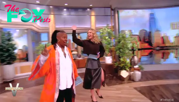 Whoopi Goldberg and Sara Haines walking on "The View"
