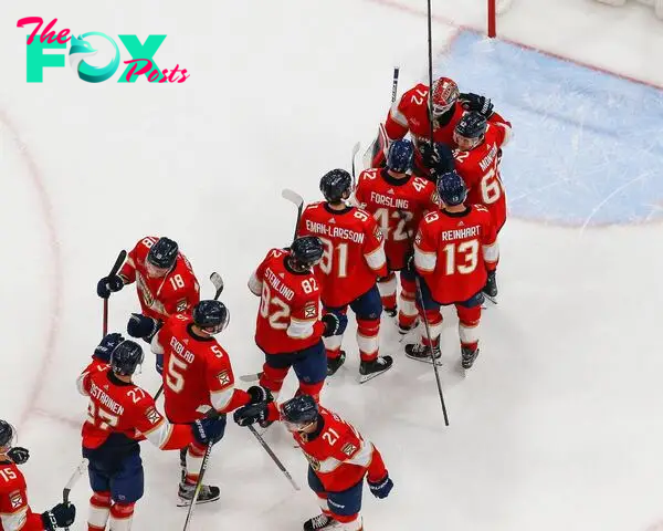 Teammates congratulate Goaltender Sergei Bobrovsky #72 of the Florida Panthers after the 6-1 win against the Tampa Bay Lightning in Game Five of the First Round of the 2024 Stanley Cup Playoffs.