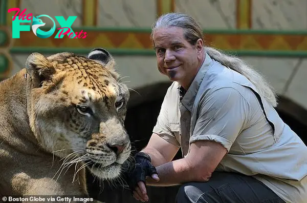 Dr. Bhagavan Antle is pictured with Hercules the liger at the wildlife reserve in Myrtle Beach, South Carolina