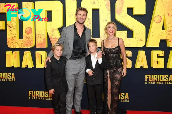 Chris Hemsworth, Elsa Pataky and their twin sons at a movie premiere.