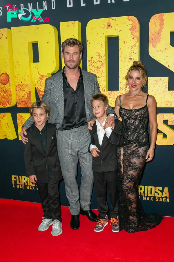 Chris Hemsworth, Elsa Pataky and their twin sons at a movie premiere.