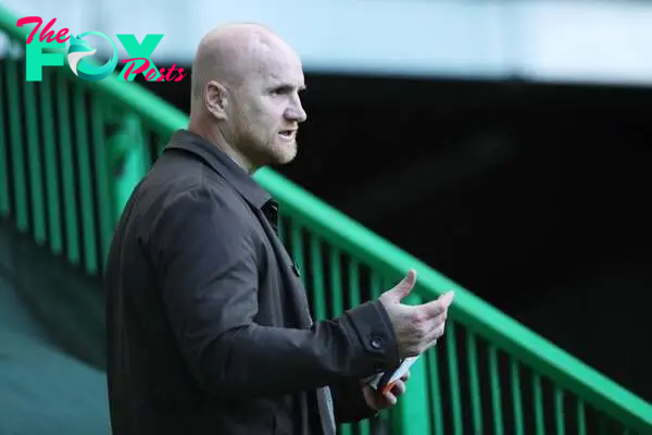 John Hartson, Former Celtic player looks on prior to the UEFA Champions League: First Qualifying Round match between Celtic and KR Reykjavik at Cel...