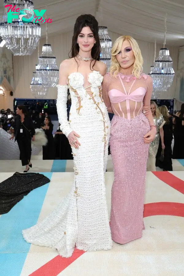 Anne Hathaway and Donatella Versace