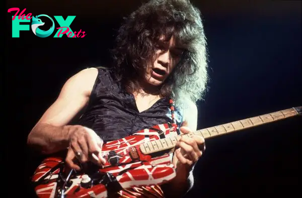 Eddie Van Halen plays the guitar.