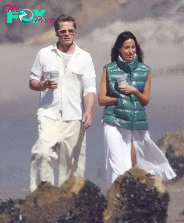 Brad Pitt and Ines de Ramon walking on the beach in Santa Barbara, Calif.