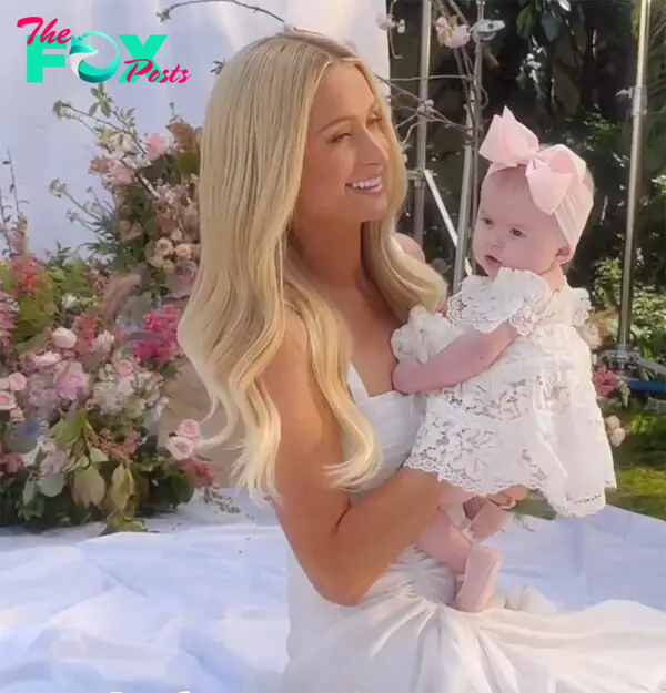 Paris Hilton holding her daughter.