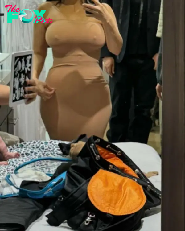 Kourtney Kardashian mirror selfie.
