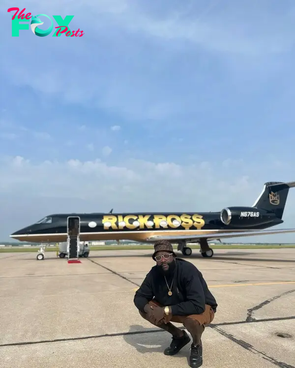 Rick Ross selfie in front on Rick Ross jet