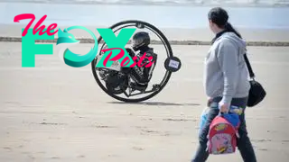 A man practices for a monowheel race in Wales, UK.