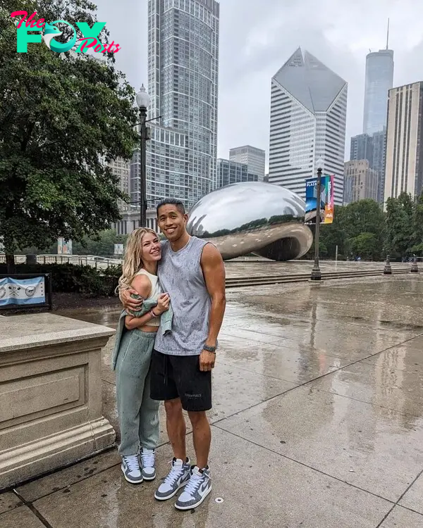 Ariana Madix and Daniel Wai posing together at the Bean in Chicago.