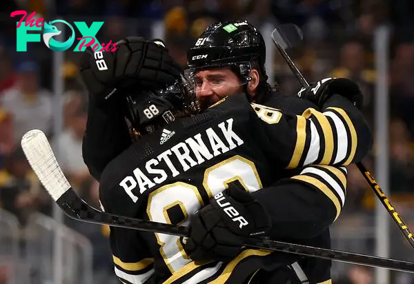 BOSTON, MASSACHUSETTS - MAY 04: David Pastrnak #88 of the Boston Bruins celebrates with his teammate Pat Maroon #61 after scoring the game winning goal against the Toronto Maple Leafs during overtime in Game Seven of the First Round of the 2024 Stanley Cup Playoffs at TD Garden on May 04, 2024 in Boston, Massachusetts.   Maddie Meyer/Getty Images/AFP (Photo by Maddie Meyer / GETTY IMAGES NORTH AMERICA / Getty Images via AFP)