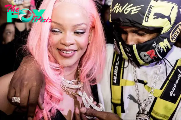 Rihanna with pink hair and A$AP Rocky in Miami. 