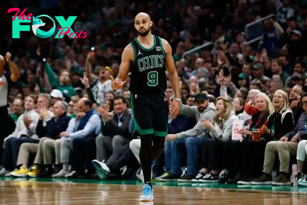 May 1, 2024; Boston, Massachusetts, USA; Boston Celtics guard Derrick White (9) after making a three point basket during the third quarter of game five of the first round of the 2024 NBA playoffs against the Miami Heat at TD Garden. Mandatory Credit: Winslow Townson-USA TODAY Sports