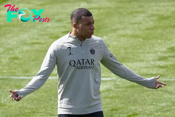 Paris Saint-Germain's French forward #07 Kylian Mbappe reacts during a training session at the "campus" of Poissy, western Paris, on May 6, 2024, on the eve of the UEFA Champions League semi-final second leg football match between Paris Saint-Germain (PSG) and Borussia Dortmund. (Photo by FRANCK FIFE / AFP)