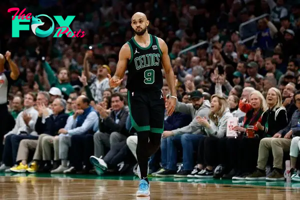 May 1, 2024; Boston, Massachusetts, USA; Boston Celtics guard Derrick White (9) after making a three point basket during the third quarter of game five of the first round of the 2024 NBA playoffs against the Miami Heat at TD Garden. Mandatory Credit: Winslow Townson-USA TODAY Sports