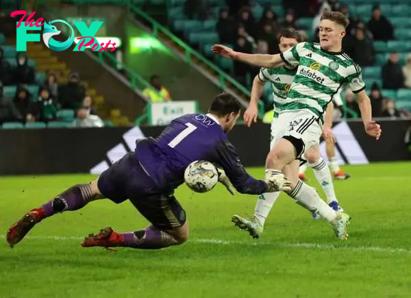 Daniel Kelly of Celtic vies with Stuart Knight of Buckie Thistl during the the Celtic v Buckie Thistle - Scottish Cup match at Celtic Park on Janua...