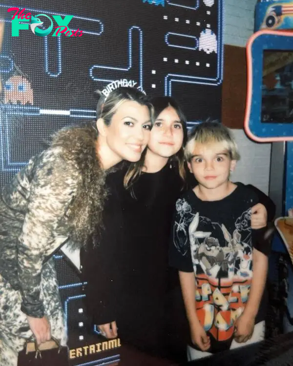 Kourtney Kardashian with Penelope and Reign