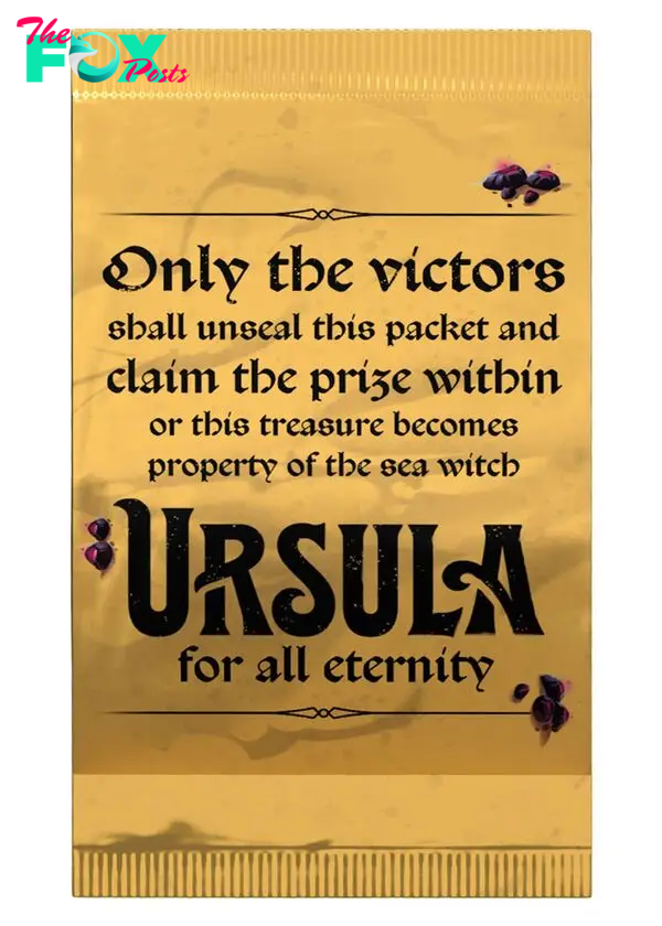 A gold foil package that reads “Only the victors shall unseal this packet and claim the prize within or this treasure becomes property of the sea witch Ursula for all eternity.”