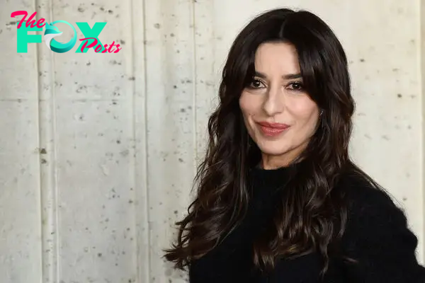 Italian actress Sabrina Impacciatore, in Ferretti clothes, during the photocall for the presentation of the film 7 donne e un mistero in Rome, Italy, onDec. 15, 2021.