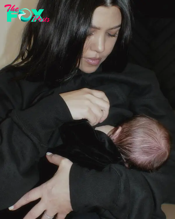 Kourtney Kardashian holding Rocky