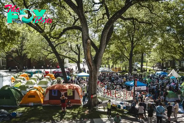Tents surround protesters as they gather at Rutgers University's College Avenue campus.