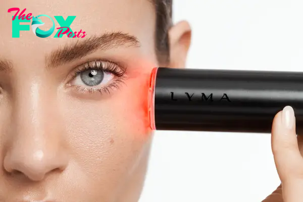 A person using the Lyma laser