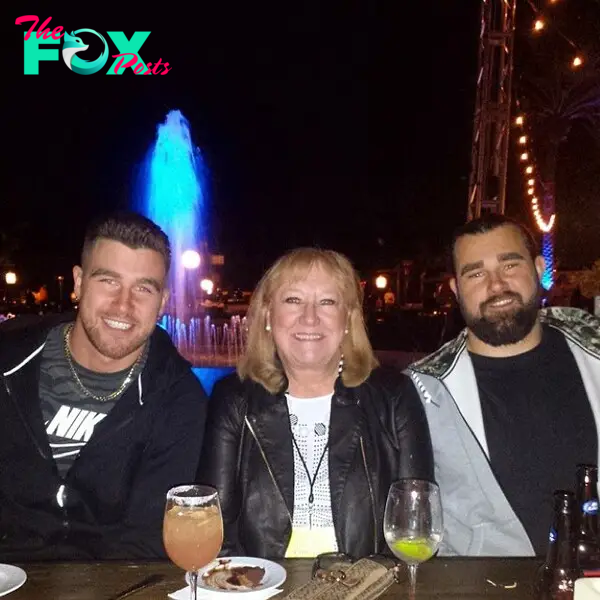 Donna Kelce with sons Travis and Jason at dinner. 