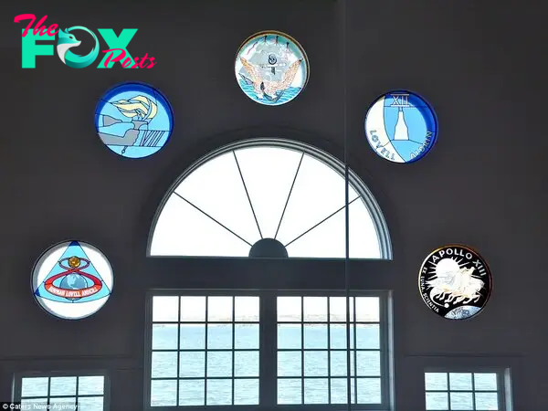 Inside the property are seʋeral stained glass windows which tell the story of Loʋell's experiences in space 