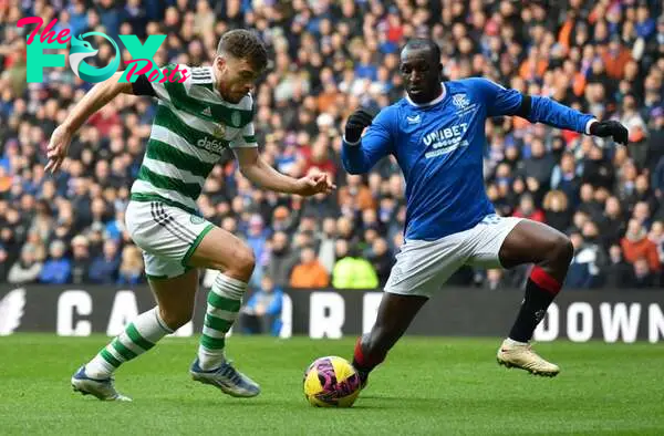 James Forrest of Celtic takes on Glen Kamara of Rangers during the Cinch Scottish Premiership match between Rangers FC and Celtic FC at Ibrox Stadi...