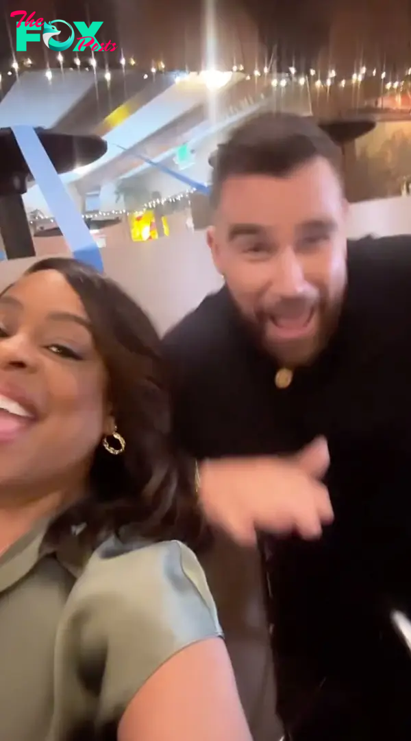 Travis Kelce and Niecy Nash.