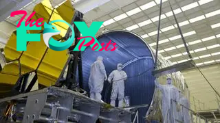 BALL AEROSPACE TECHNICIANS REMOVE FINAL SIX JWST MIRRORS TESTED AT MSFC X-RAY AND CRYOGENIC FACILITY