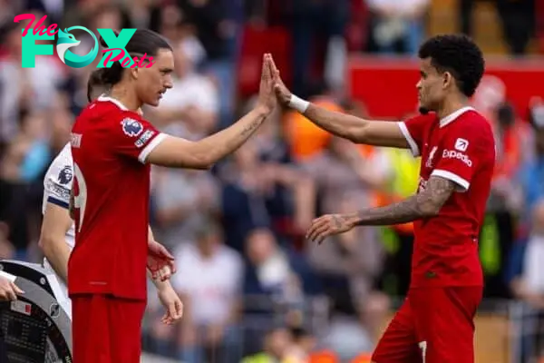 LIVERPOOL, ENGLAND - Sunday, May 5, 2024: Liverpool's substitute Darwin Núñez (L) replaces Luis Díaz during the FA Premier League match between Liverpool FC and Tottenham Hotspur FC at Anfield. Liverpool won 4-2. (Photo by Ryan Brown/Propaganda)