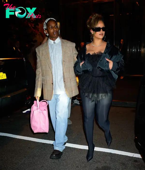 A$AP Rocky and Rihanna walking