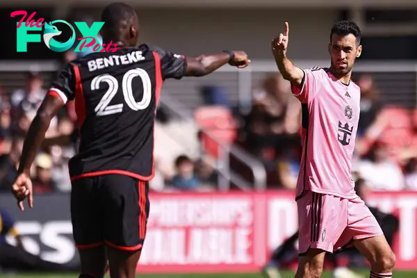 Sergio Busquets #5 of Inter Miami reacts in front of Christian Benteke #20 of D.C. United