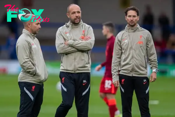 ROCHDALE, ENGLAND - Tuesday, August 31, 2021: Liverpool's manager Barry Lewtas (C) chats with Under-18's coach Marc Bridge-Wilkinson (L) and fitness coach Jack Ade (R) during the pre-match warm-up before the English Football League Trophy match between Rochdale AFC and Liverpool FC Under-21's at Spotland Stadium. Rochdale won 4-0. (Pic by David Rawcliffe/Propaganda)