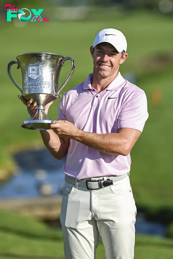 Rory McIlroy holding his trophy in 2024.